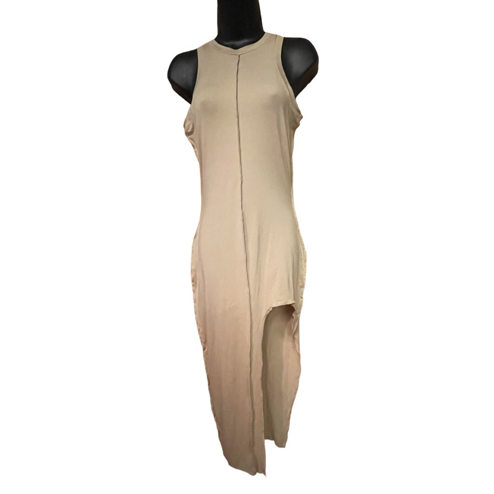 Unique beige colored full length dress.
